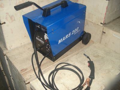 Mig- welder 200 amp industrial grade unit 