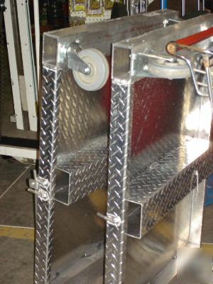 2) rolling industrial aluminum metro cart