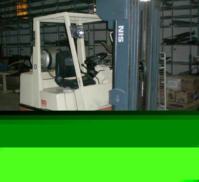 Nissan 6000 lb. propane riding fork truck cushion tire
