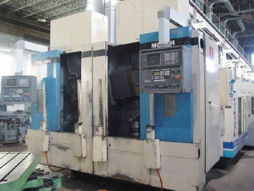 Motch vertical twin spindle cnc turning center 1998