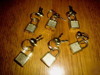 Six luggage padlocks