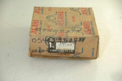 New asahi bearing units UCFC208 mounted surplus in box