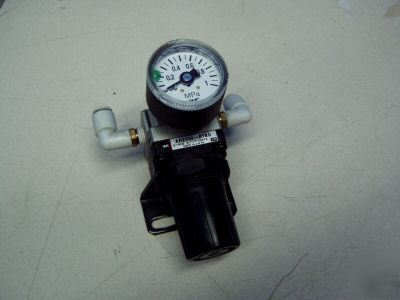 Smc regulator w/ 0-1 mpa gauge m/n: AR2060-O1BG