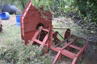 Hammer mill - huge flywheel with knives on it