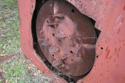 Hammer mill - huge flywheel with knives on it